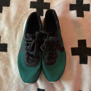 Emerald green Converse running shoes